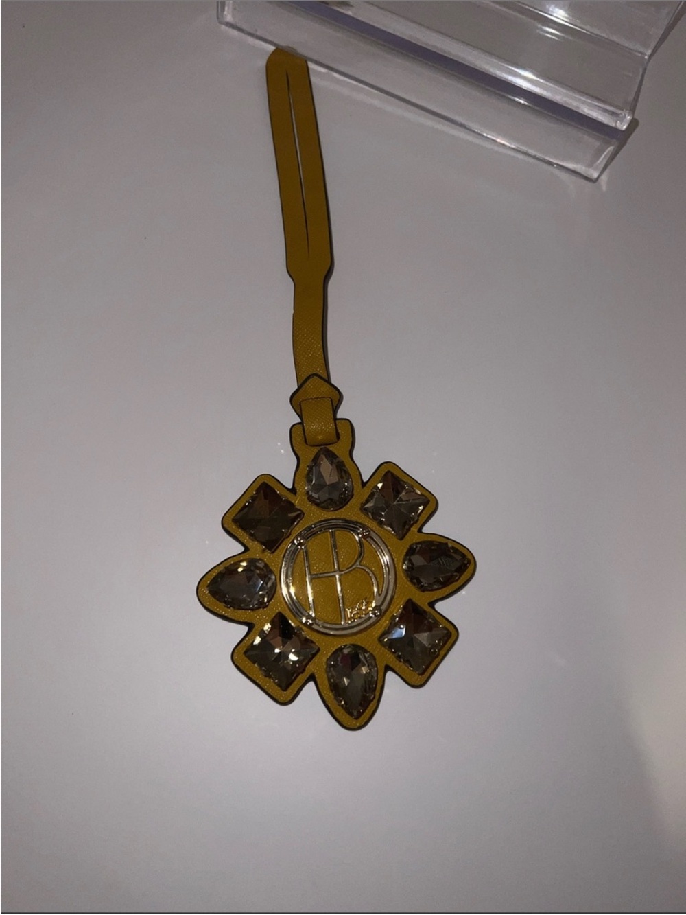 Henri Bendel West 57th bag charm features rhinestone embellishments